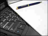Computer with papers